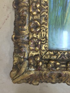 The antique gilded frame needed restoraion and the corners needed structural repair.
